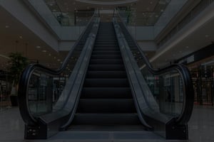 upward-moving escalator in the shopping center