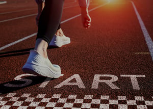 medium-vecteezy_runner-is-preparing-to-take-step-forward-on-track-with-word_75543547_medium